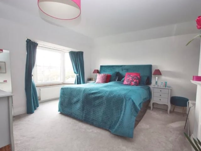 This property five bedrooms, three bathrooms and four reception rooms.