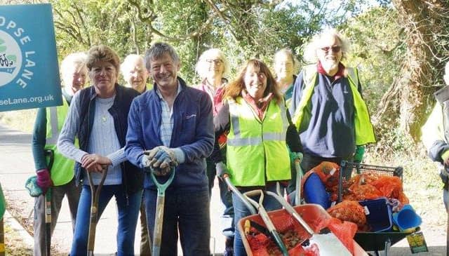 Save Long Copse Lane campaigners. Andrew Hunnibal is centre holding a spade.