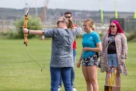 Parent Carers and Rebecca Johnson having a go at archery Picture: Habibur Rahman