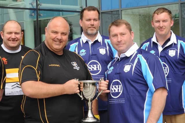 Ian Douglas, second right, could become the oldest player to ever appear for Portsmouth's 1st XV this weekend.