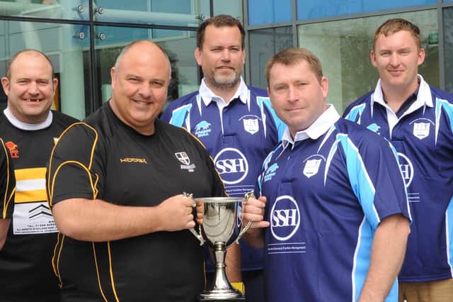 Ian Douglas, second right, could become the oldest player to ever appear for Portsmouth's 1st XV this weekend.