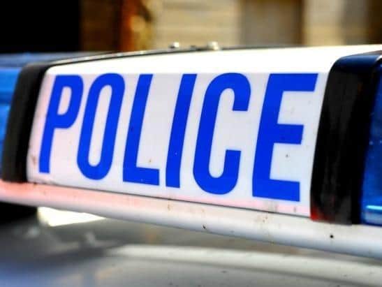 Class A drugs, guns and cash were seized.