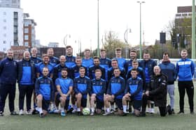 The US Portsmouth squad pictured before their Tuesday training session at HMS Temeraire this week. Back (from left): Harry Birmingham, Andrew Todd, Tom Price
Jay Ripiner, Liam Kyle, Sonny Harnett-Balkwill, Harry Sargeant, Harry Bedford, German Lopez (coaching assistant), Josh Rance (analyst). Middle: Fraser Quirke (assistant manager), Glenn Turnbull (manager), Tyler Moret, Tom Jeffes, Jordan Pile, Dec Seiden, Tom Cain, James Franklyn. Front: Elliott Turnbull, Jack Chandler, Daniel Sibley, Frankie Paige, Callum Glen, Brodie Spencer, Paul Barton (head coach). Missing: Josh Hazell, George Root, Cam Quirke, Owen Haly, Stefan Stefan (physio).
