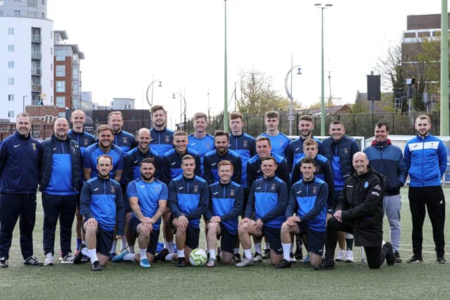 The US Portsmouth squad pictured before their Tuesday training session at HMS Temeraire this week. Back (from left): Harry Birmingham, Andrew Todd, Tom Price
Jay Ripiner, Liam Kyle, Sonny Harnett-Balkwill, Harry Sargeant, Harry Bedford, German Lopez (coaching assistant), Josh Rance (analyst). Middle: Fraser Quirke (assistant manager), Glenn Turnbull (manager), Tyler Moret, Tom Jeffes, Jordan Pile, Dec Seiden, Tom Cain, James Franklyn. Front: Elliott Turnbull, Jack Chandler, Daniel Sibley, Frankie Paige, Callum Glen, Brodie Spencer, Paul Barton (head coach). Missing: Josh Hazell, George Root, Cam Quirke, Owen Haly, Stefan Stefan (physio).