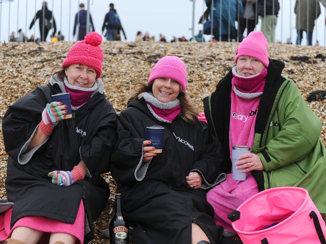 Pictured is: (l-r) The Pink Dippers Susie Lees, George Mearns from Gosport and Sarah Jenns from Fareham. Picture: Sarah Standing (010124-4343)