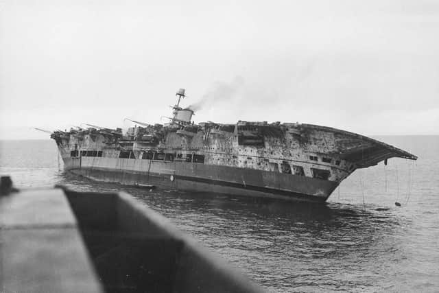 HMS Ark Royal pictured as she started to sink in the Mediterranean.