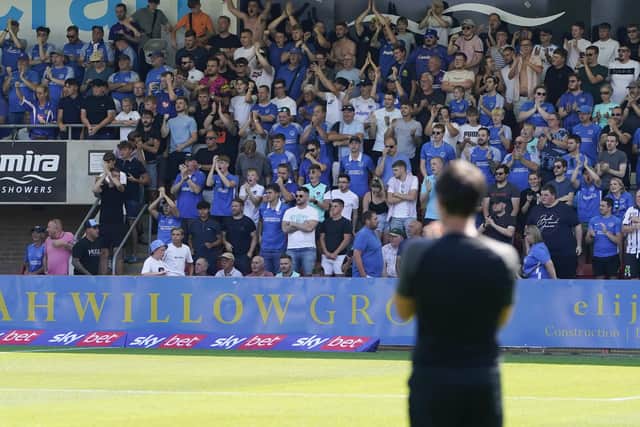 Danny Cowley applauds the Fratton faithful at Cheltenham on Saturday.