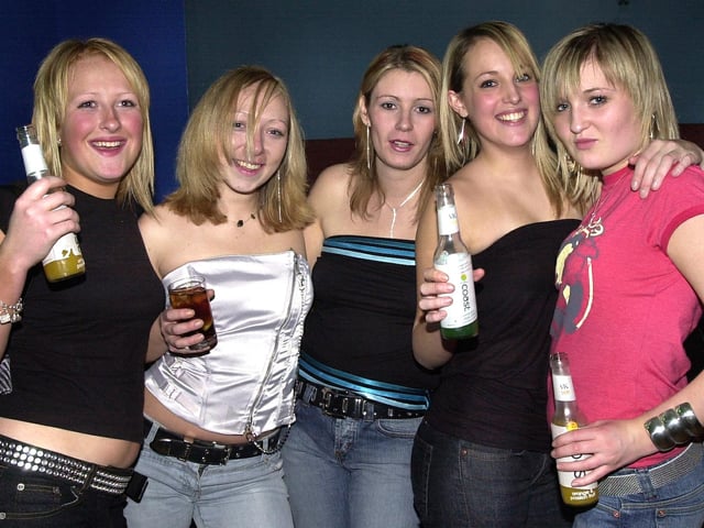 Clubbers having a good time at the Bar Bluu nightclub in Clarendon Road, South Parade, Southsea, in the 00s.