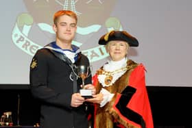 Promising young sailor Leading Engineering Technician Daniel Harrison receiving the HMS Collingwood Award from the retiring Mayor of Fareham Susan Bayford. Daniel died while serving on HMS Kent earlier this month. Picture: Sarah Standing (090519-8710)