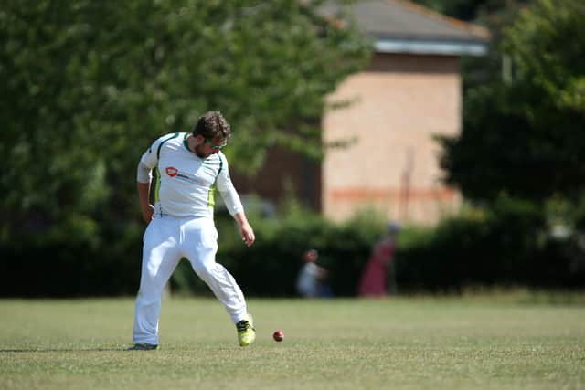 Emsworth's Lewis Roberts tries to stop the ball with his feet during the game against Hayling Island. Picture: Chris Moorhouse