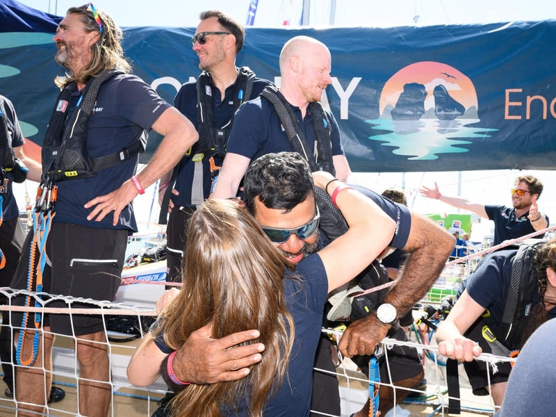 Crew members hug and greet family and friends at Gunwharf.Picture: Keith Woodland (270721-93)