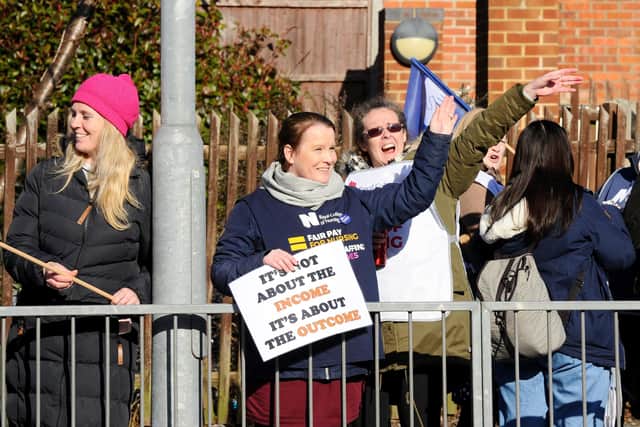 Nurses on strike at the picket line oustide QA hospital on February 6, 2023.
