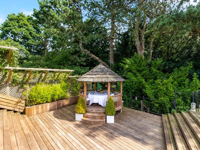 This snug thatched dining gazebo is perfect for entertaining guests and enjoying a spot of al fresco dining. The gazebo is heated so it can be used in all seasons and it seats up to twelve.
