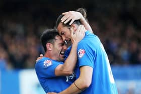 Former Pompey team-mates Gary Roberts and Christian Burgess