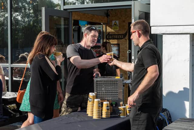 Complimentary drinks served on entry to customers who had booked tickets in advance. Picture: Mike Cooter (280523)