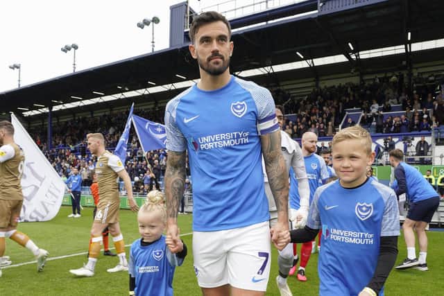 Marlon Pack leads Pompey out for their final game of the 2022-23 season against Wycombe
