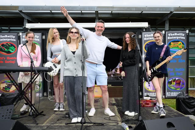 Pictured is: Andy Grant, Executive Principal of the Learning Trust at ST Vincents College with the band VigilantePicture: Keith Woodland (080621-45)