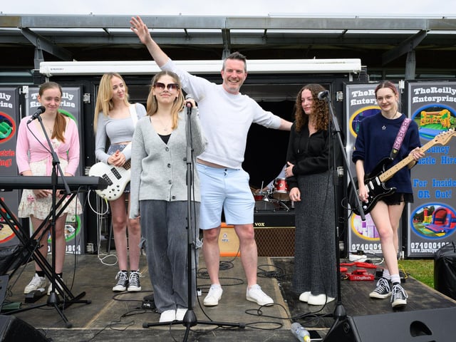 Pictured is: Andy Grant, Executive Principal of the Learning Trust at ST Vincents College with the band VigilantePicture: Keith Woodland (080621-45)