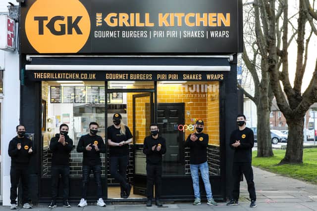 Manager Anhar Uddin, third from right, and staff at The Grill Kitchen, Fratton Rd, PortsmouthPicture: Chris Moorhouse      (230321-29)