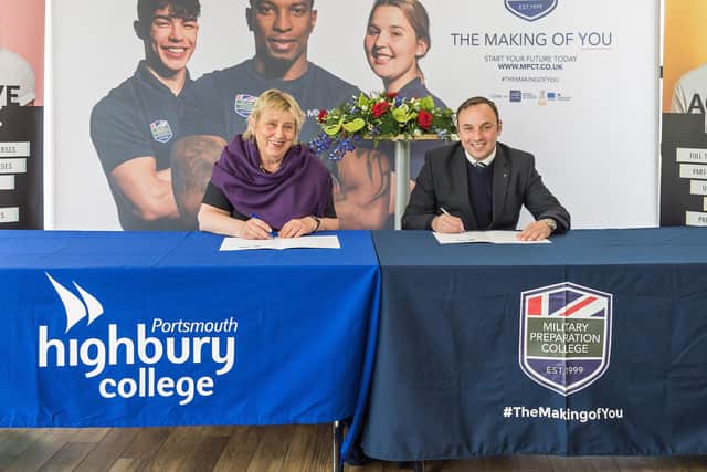 Penny Wycherley, Highbury College Interim Principal and CEO with Huw Lewis, Founding Managing Director of Motivational Preparation College for Training (MPCT), signing the Memorandum Of Understanding. Pictured: Penny Wycherley and Huw Lewis. Picture: Mike Cooter (130521)