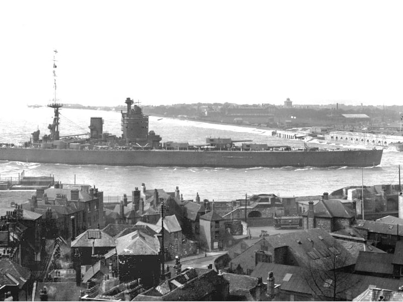 Sometime pre-1936 we see the battleship HMS Nelson entering Portsmouth Harbour.