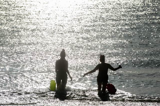 Friends Jan Lathem and Mel Knibbs in the sea at Southsea
Picture: Habibur Rahman