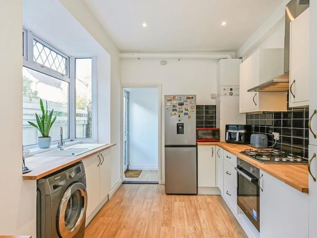 The listing says: "This stunning mid-terrace home has recently undergone a comprehensive renovation throughout, seamlessly blending contemporary design with classic charm. Boasting three bedrooms, this residence offers a perfect canvas for a vibrant and comfortable lifestyle."