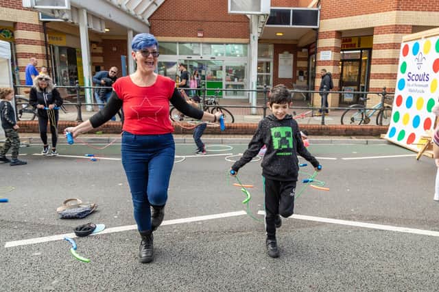 Mum Daiane Seif (47) with son Georg Seif (8) learning to use a skipping rope at the Feel Good Fratton event. Picture: Mike Cooter (021022)