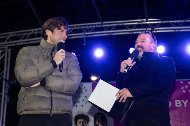 Hundreds of residents descended on Commercial Road to watch local dance troops and celebrities come together to turn on the Christmas lights.
Pictured - James Argent and Shaun Williamson sang YMCA to the crowds
Photos by Alex Shute