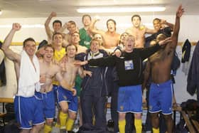 Hawks celebrate their FA Cup win at Notts County in 2007 with Shaun Wilkinson third from the left in the front row. Pic: Dave Haines