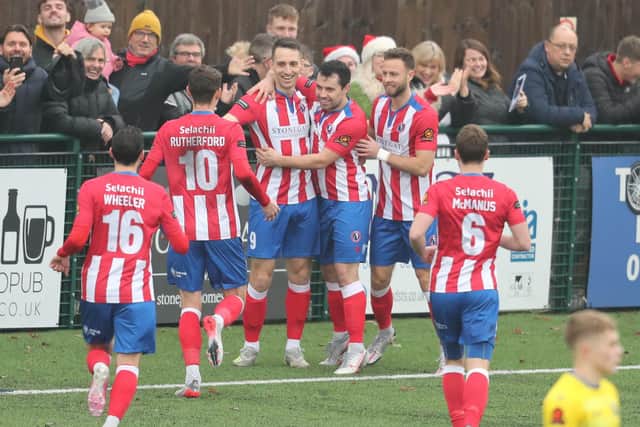 Dorking celebrate one of their five first half goals. Picture: Dave Haines