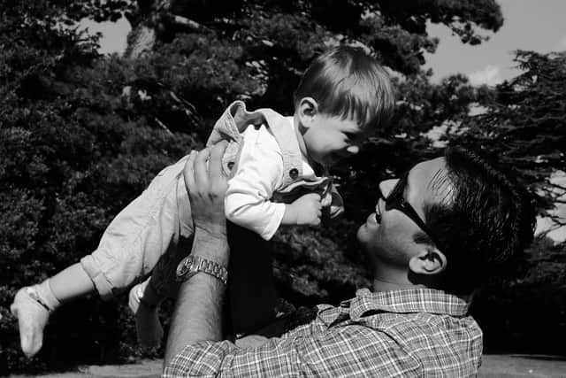 Mitra with his son, Rohan.