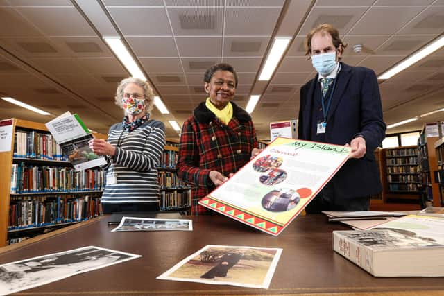 From left to right, Assistant library manager Jackie Painting, Marie Costa and archivist at Portsmouth History centre Dr John Stedman, at the lauch of Portsmouth Black History which is, 'a living history, not just for Black History Month.' They are pictured at Portsmouth History Centre, Central Library, Portsmouth
Picture: Chris Moorhouse      (080321-23)