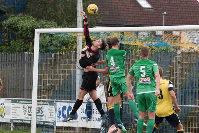 Jake Hallett was caught off his line from 40 yards for Melksham's second goal. Picture: Duncan Shepherd