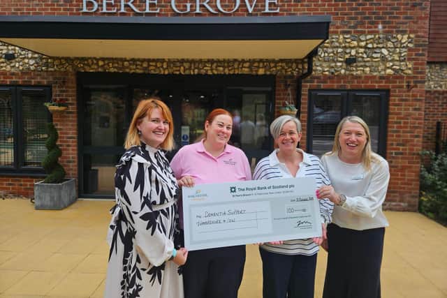 Bere Grove Staff present a cheque to Vicki Johnston at local charity Dementia Support Hampshire and IOW