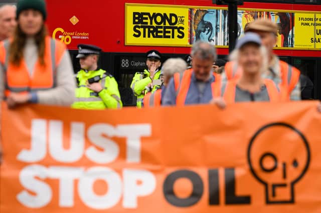 Just Stop Oil protestors were drenched in water after slowly marching down a road in Camden, North London, yesterday (June 22). Pictured is a Just Stop Oil demonstration on May 31, 2023, in London. Picture: Leon Neal/Getty Images.