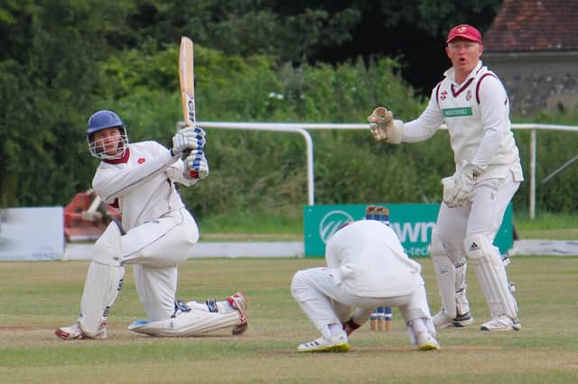 Havant's Chris Stone hits a six during his half-century at South Wilts. Picture by Ron Honeybone.