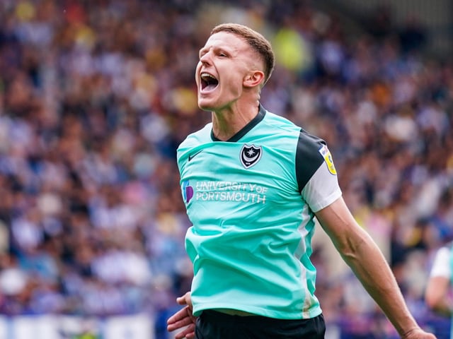 Pompey's new-man celebrates his goal in front of the loud Fratton faithful.