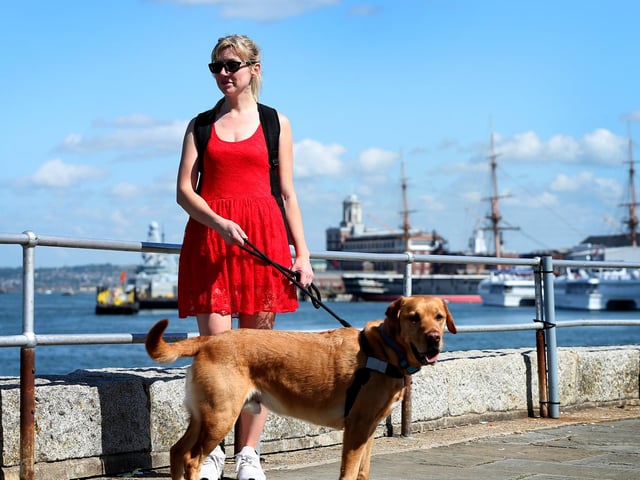 Amy Silvester and Barney, Old Portsmouth. Picture: Chris Moorhouse (250524-04)