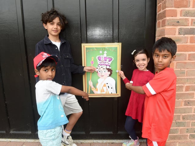 Residents in Veryan, Fareham at their street party on Saturday - at the back, from left, Sebastian Boyle, 11, and his sister Imogen Boyle, five, with front left, Ben Manohar, five and Alex Manohar, seven (040622-9423)
