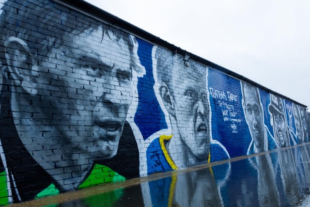 Rain couldn't dampen spirits at the unveiling with Alan Knight and Robert Prosinecki also depicted.