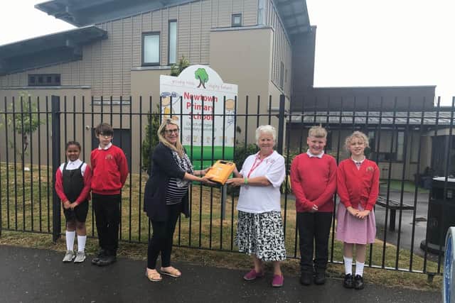 Children on the School's Council were present when the defibrillator was handed over by Elizabeth Humphries (Right) and given to Head Teacher, Emma Howlett (Left)
