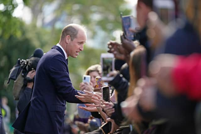 The Prince of Wales meets members of the public in the queue along the South Bank, near to Lambeth Bridge, London, as they wait to view Queen Elizabeth II lying in state ahead of her funeral on Monday. Picture date: Saturday September 17, 2022. Picture: Aaron Chown/PA.