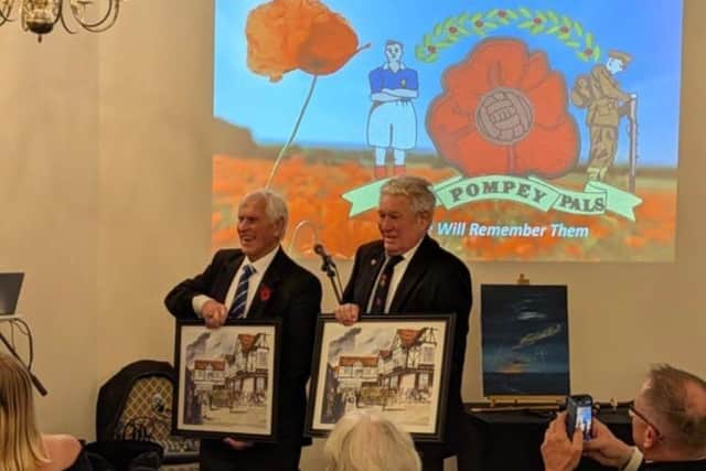 Main speaker Ray Crawford and Barry Harris receiving a thank you gift