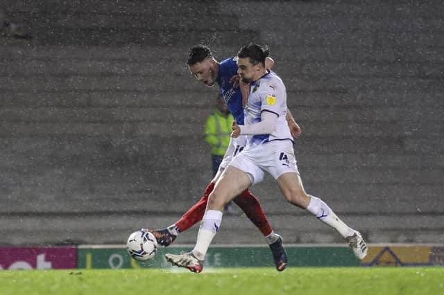 George Hirst fires off a shot in first-half time added on to hand Pompey a half-time lead against Oxford. Picture: Robin Jones/Digital South