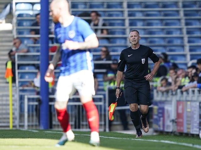 Pompey fan Julian Browning running the line at Fratton Park after answering the Blues' SOS