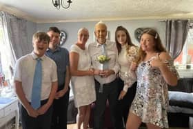 Guy and Nicki, centre, with the rest of their family. Picture: Supplied