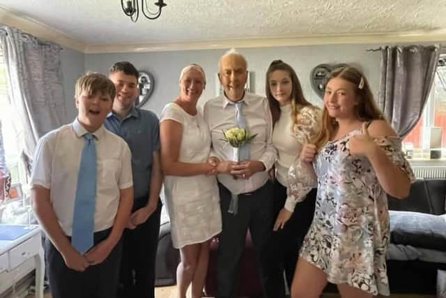 Guy and Nicki, centre, with the rest of their family. Picture: Supplied
