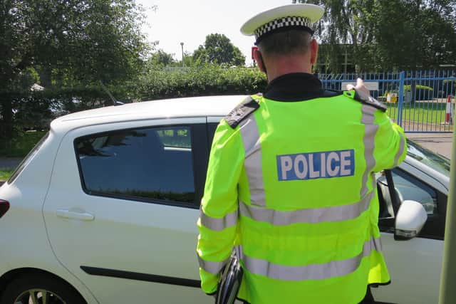 Sgt Scott Kerr talks to a driver caught travelling at 43mph in a 30mph zone in Horndean Road, Emsworth on July 20.

Hampshire police are supporting a national speeding campaign. Picture: Ben Fishwick