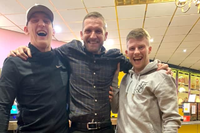 Pompey favoruites Ronan Curtis and Andy Cannon have become regulars at Cosham Crown Bingo, which is managed by Darren Bessey (centre)